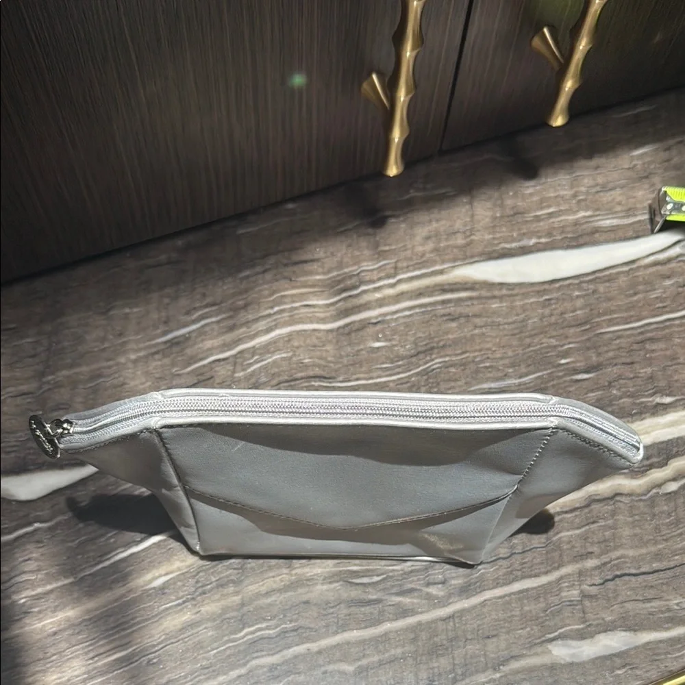La Prairie Silver Cosmetic Bag with Geometric Design